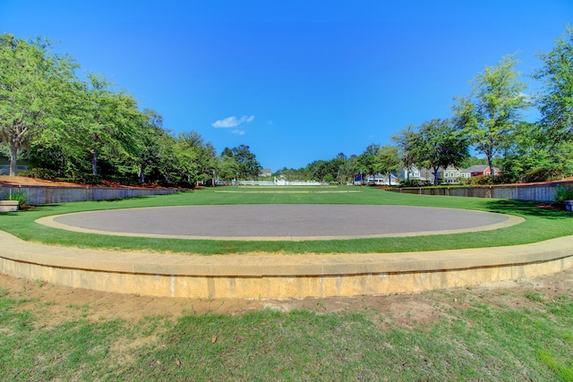 view of home's community featuring a yard