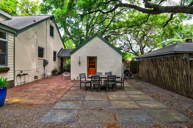 view of patio featuring a fenced backyard and outdoor dining space