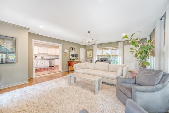 803 Burnett Dr, Charleston, SC 29412 - living room featuring a chandelier, baseboards, light wood-type flooring, recessed lighting, and crown molding