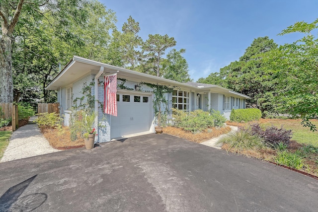 803 Burnett Dr, Charleston, SC 29412 - single story home featuring a garage, fence, brick siding, and driveway
