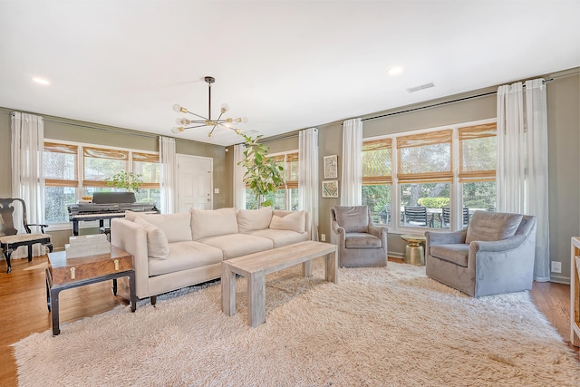 803 Burnett Dr, Charleston, SC 29412 - living area with a chandelier and wood finished floors
