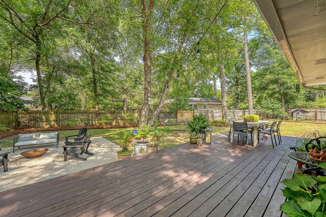 803 Burnett Dr, Charleston, SC 29412 - wooden terrace featuring outdoor dining space, view of scattered trees, and outdoor lounge area