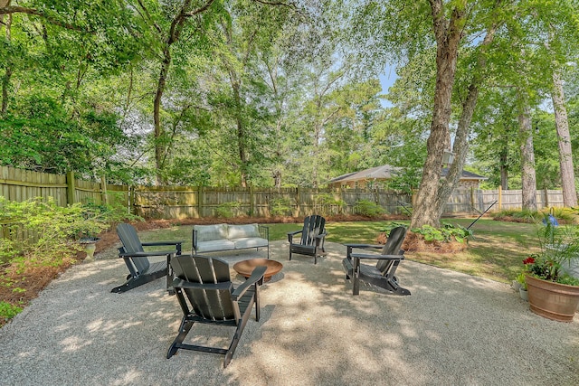 803 Burnett Dr, Charleston, SC 29412 - view of patio featuring a fenced backyard and an outdoor fire pit