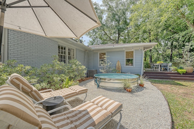 803 Burnett Dr, Charleston, SC 29412 - view of patio / terrace featuring a jacuzzi, a wooden deck, and central AC