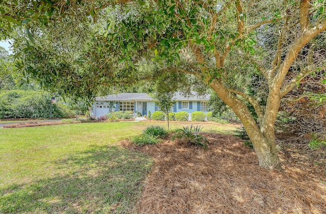 803 Burnett Dr, Charleston, SC 29412 - ranch-style home featuring a front lawn and a garage