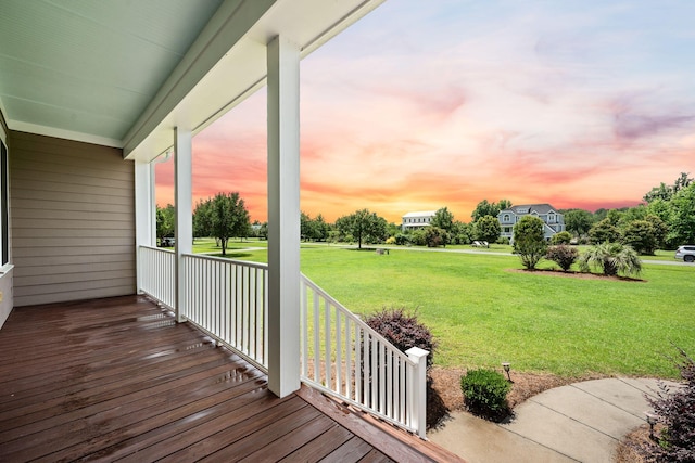 727 Sonny Boy Ln, Johns Island, SC 29455 - wooden porch with a lawn