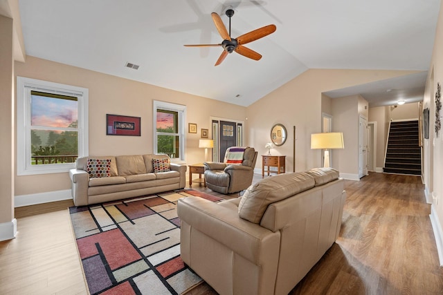 727 Sonny Boy Ln, Johns Island, SC 29455 - living area with ceiling fan, wood finished floors, lofted ceiling, stairs, and baseboards