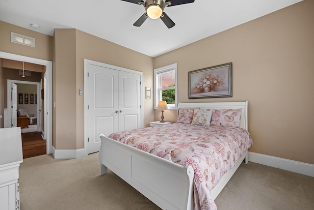 727 Sonny Boy Ln, Johns Island, SC 29455 - bedroom featuring light carpet, a closet, baseboards, and a ceiling fan