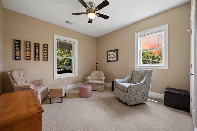727 Sonny Boy Ln, Johns Island, SC 29455 - living area featuring carpet floors, baseboards, and a ceiling fan