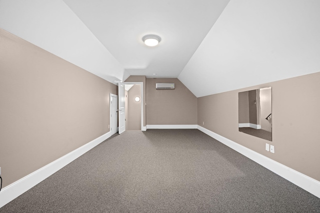 727 Sonny Boy Ln, Johns Island, SC 29455 - bonus room featuring a wall unit AC, baseboards, lofted ceiling, and dark colored carpet