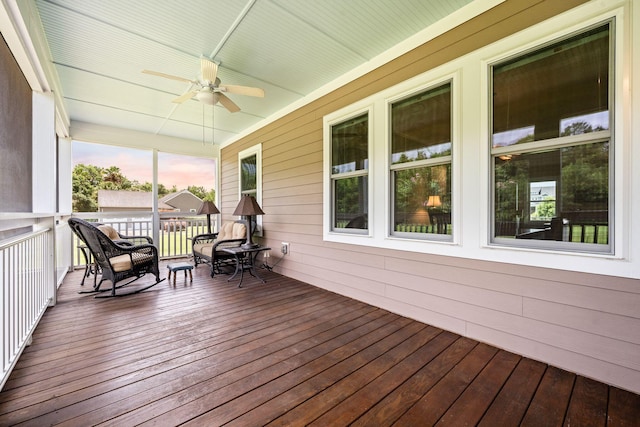 727 Sonny Boy Ln, Johns Island, SC 29455 - sunroom with a ceiling fan, wood-type flooring, and wooden walls