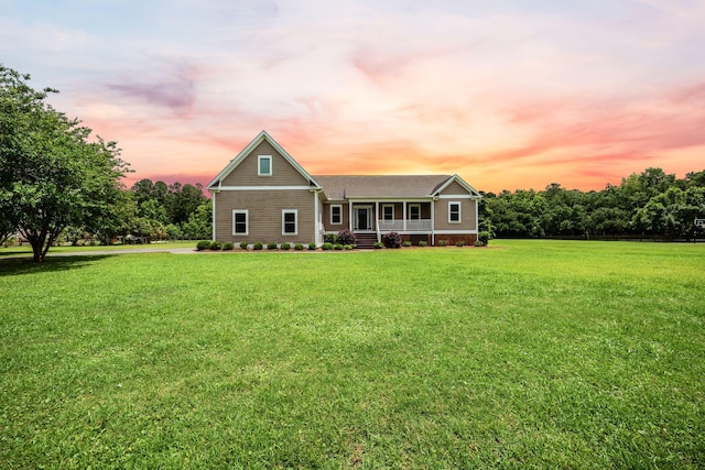 727 Sonny Boy Ln, Johns Island, SC 29455 - view of front of home featuring covered porch and a lawn