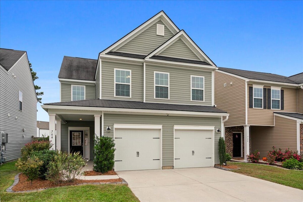 craftsman-style house featuring a garage