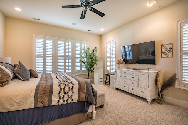 carpeted bedroom with ceiling fan