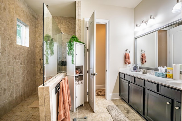 15 Carter Oaks, Ladys Island, SC 29907 - bathroom featuring a walk in shower, double vanity, tile patterned floors, and baseboards