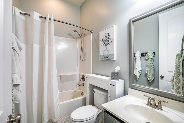 full bathroom featuring vanity, toilet, and shower / tub combo