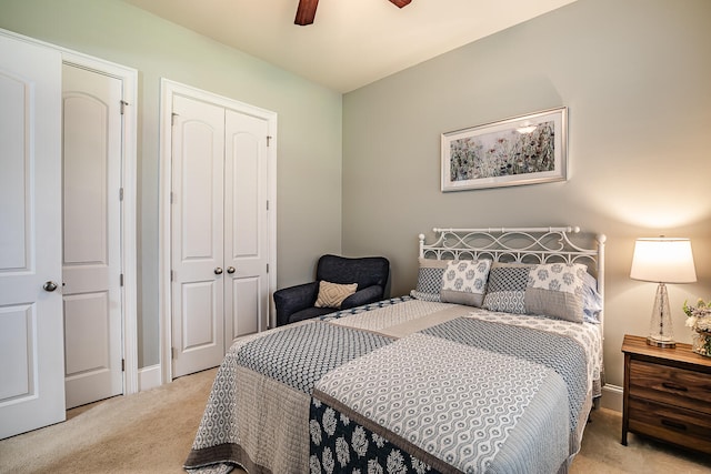 bedroom with light colored carpet and ceiling fan