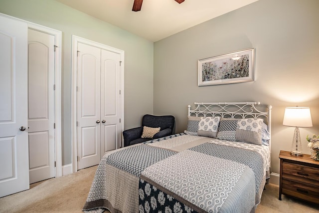 15 Carter Oaks, Ladys Island, SC 29907 - bedroom with light colored carpet, a closet, a ceiling fan, and baseboards