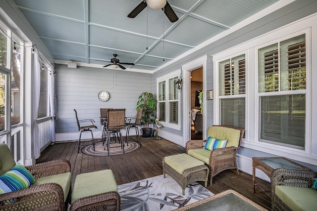15 Carter Oaks, Ladys Island, SC 29907 - sunroom / solarium with a ceiling fan and outdoor dining space