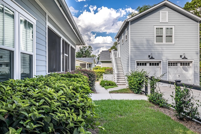 view of side of property featuring a garage