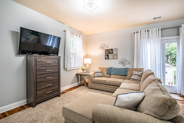 living room with hardwood / wood-style floors