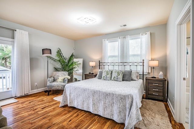 bedroom featuring hardwood / wood-style floors