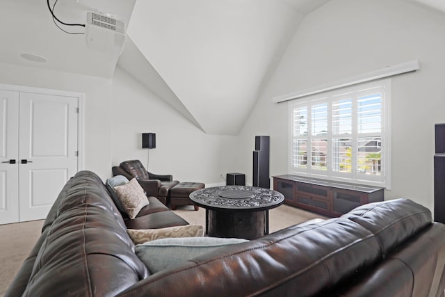 carpeted living room with lofted ceiling