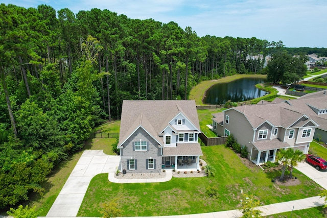 birds eye view of property featuring a water view