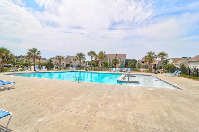 view of pool featuring a patio