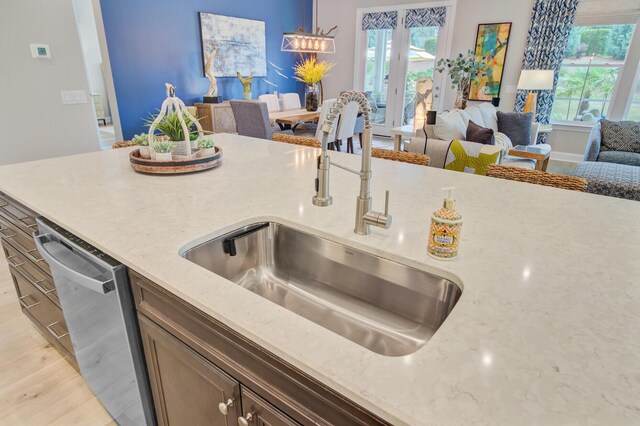 366 Tupelo Lake Dr, Summerville, SC 29486 - kitchen featuring a sink, open floor plan, healthy amount of natural light, and light wood-style floors