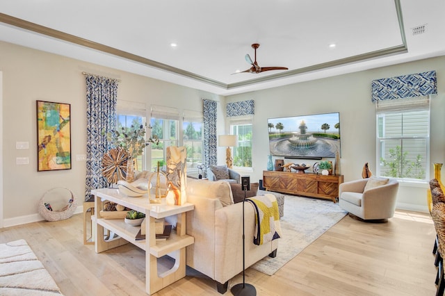 366 Tupelo Lake Dr, Summerville, SC 29486 - living area with light wood-type flooring, a tray ceiling, recessed lighting, baseboards, and a ceiling fan