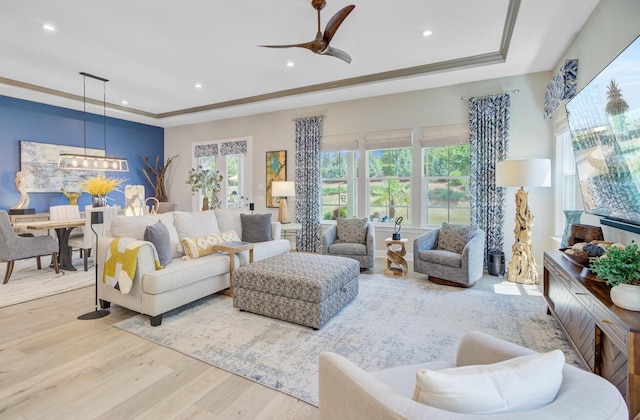 366 Tupelo Lake Dr, Summerville, SC 29486 - living area with a tray ceiling, wood finished floors, a ceiling fan, a chandelier, and recessed lighting