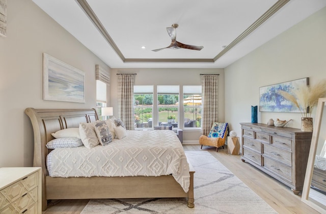 366 Tupelo Lake Dr, Summerville, SC 29486 - bedroom with a raised ceiling, light wood-style flooring, and ceiling fan