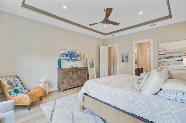 366 Tupelo Lake Dr, Summerville, SC 29486 - bedroom featuring a tray ceiling, light wood-type flooring, recessed lighting, ensuite bathroom, and a ceiling fan