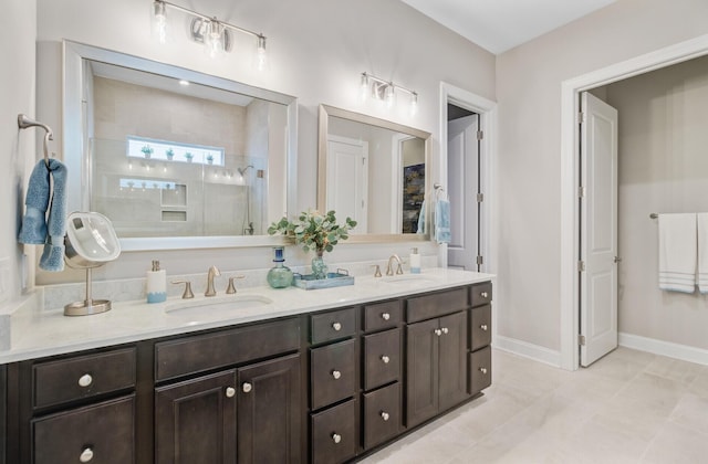 366 Tupelo Lake Dr, Summerville, SC 29486 - bathroom with double vanity, a stall shower, and baseboards