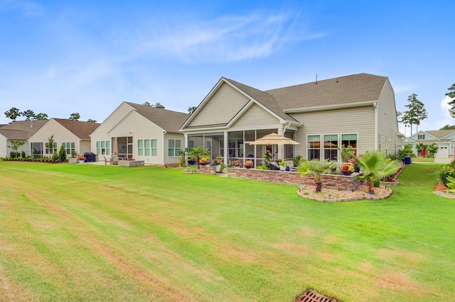 366 Tupelo Lake Dr, Summerville, SC 29486 - rear view of property featuring a sunroom and a lawn