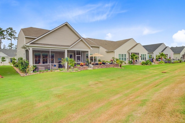 366 Tupelo Lake Dr, Summerville, SC 29486 - back of property featuring a sunroom and a lawn