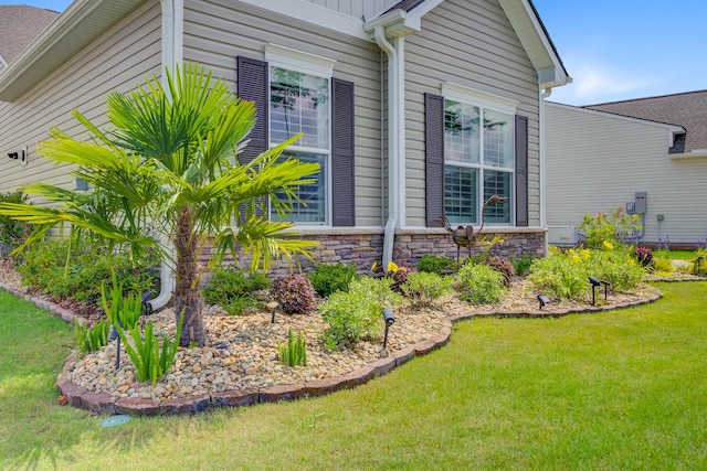 366 Tupelo Lake Dr, Summerville, SC 29486 - view of side of property featuring a lawn and stone siding