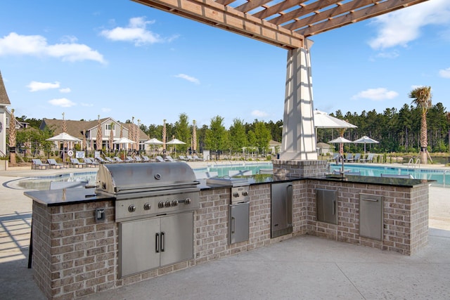 366 Tupelo Lake Dr, Summerville, SC 29486 - view of patio with a pergola, a community pool, and a sink