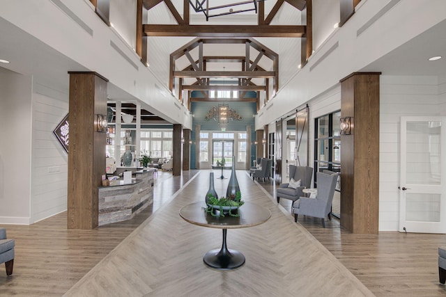 366 Tupelo Lake Dr, Summerville, SC 29486 - lobby featuring high vaulted ceiling, wood walls, and beam ceiling