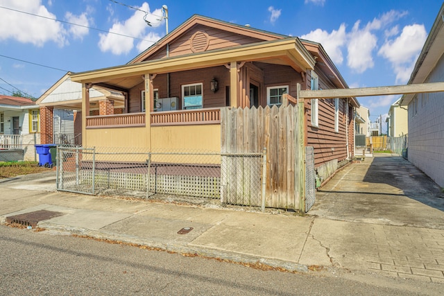 bungalow-style home with covered porch