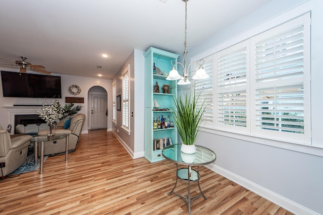 interior space featuring a chandelier and hardwood / wood-style flooring