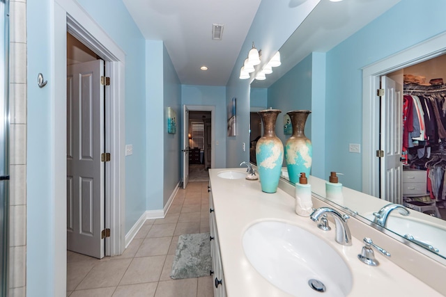 bathroom featuring tile patterned floors and vanity