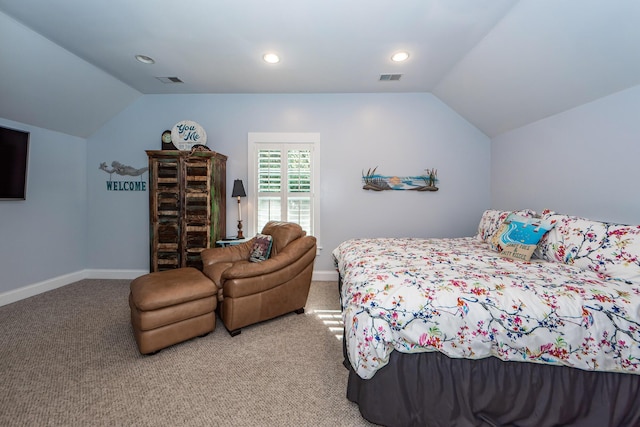 bedroom with light carpet and lofted ceiling