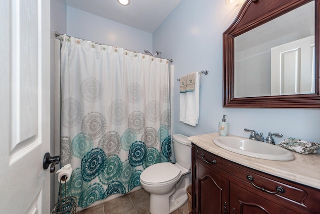 bathroom with curtained shower, tile patterned flooring, vanity, and toilet