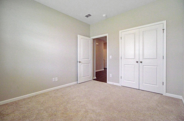 104 Wild Orchid Way, Huger, SC 29450 - unfurnished bedroom featuring carpet floors and a closet