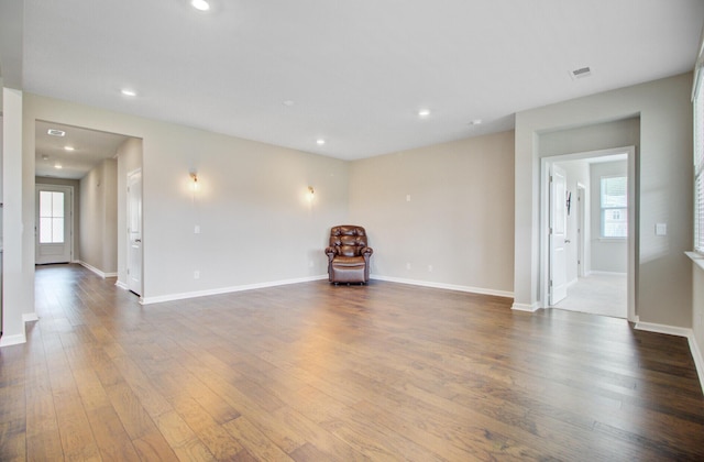 104 Wild Orchid Way, Huger, SC 29450 - unfurnished living room with wood finished floors and recessed lighting