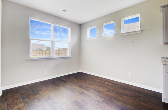 104 Wild Orchid Way, Huger, SC 29450 - unfurnished room with dark wood-style floors and baseboards