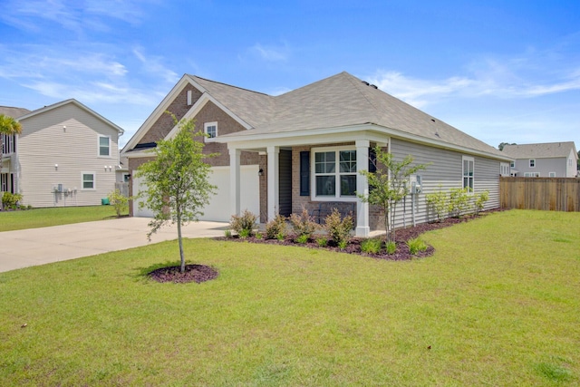 104 Wild Orchid Way, Huger, SC 29450 - view of front of property with driveway and a garage