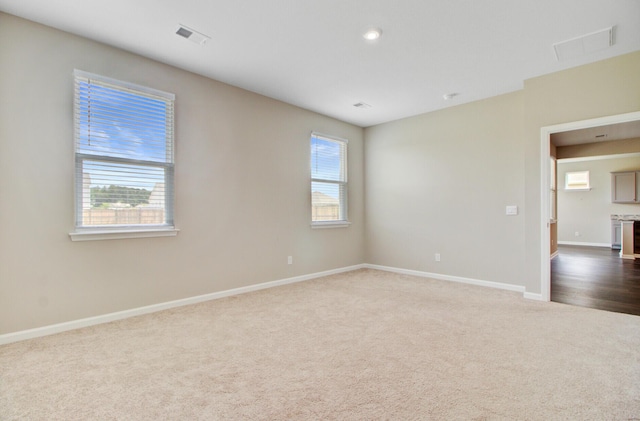 104 Wild Orchid Way, Huger, SC 29450 - carpeted spare room with baseboards